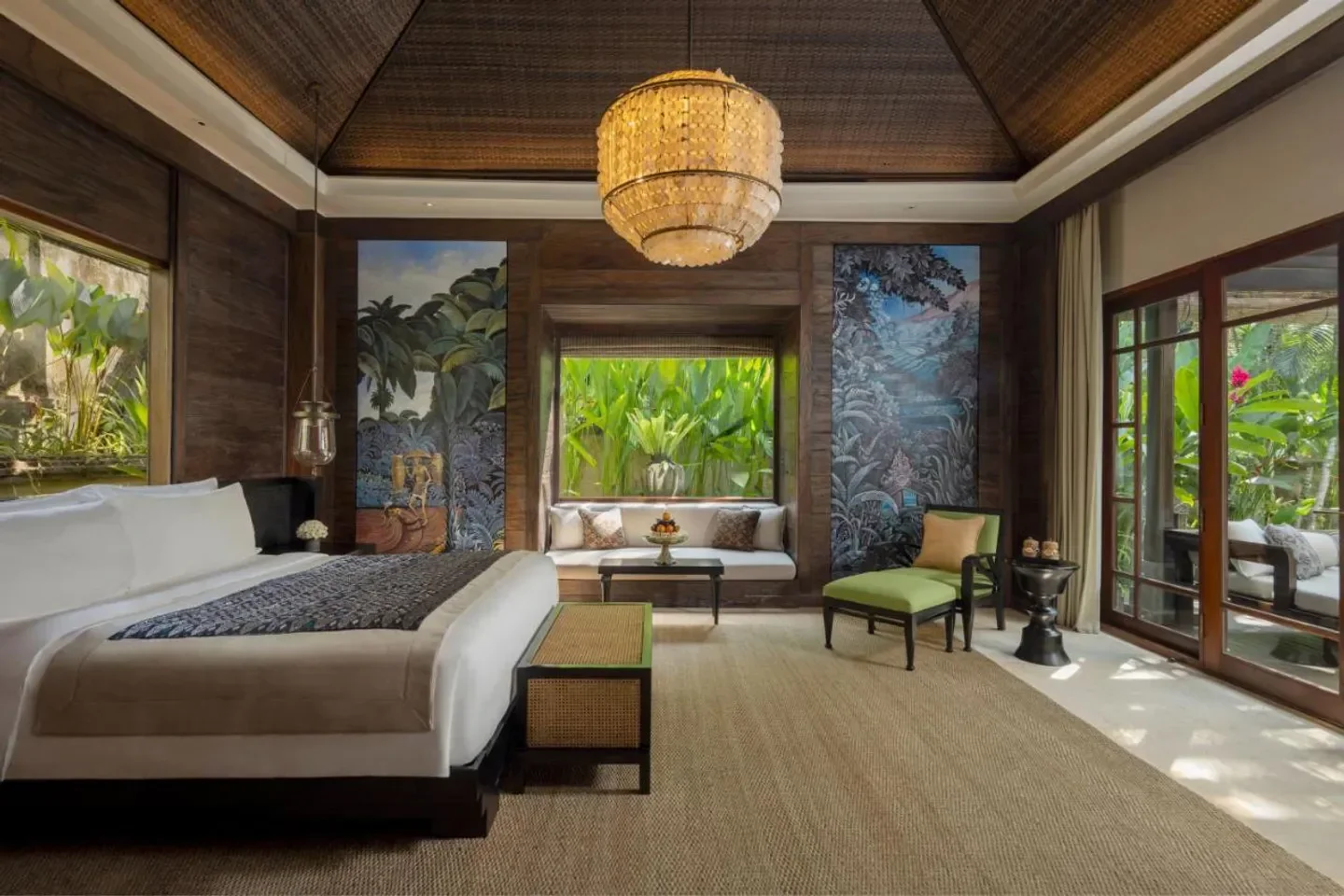 Luxury bedroom at Mandapa, a Ritz-Carlton Reserve in Bali, featuring lush views and decor.