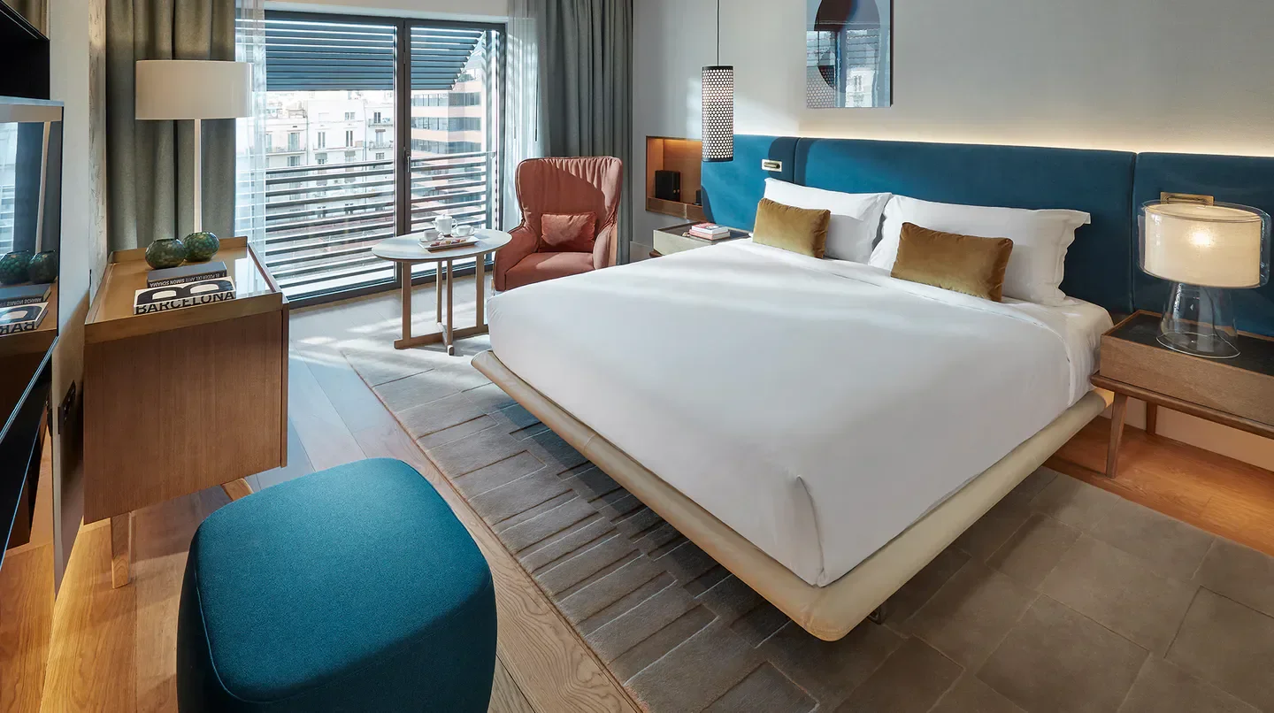 Luxury bedroom at Mandarin Oriental, Barcelona. Stylish interior with city views in Barcelona.