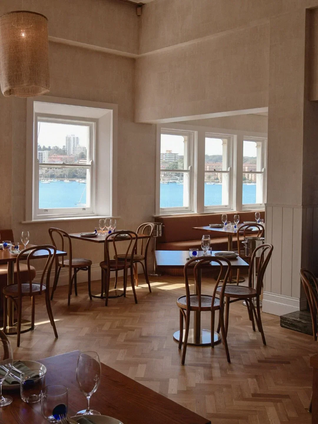 Interior of Manly Pavilion restaurant in Sydney, featuring water views and elegant dining