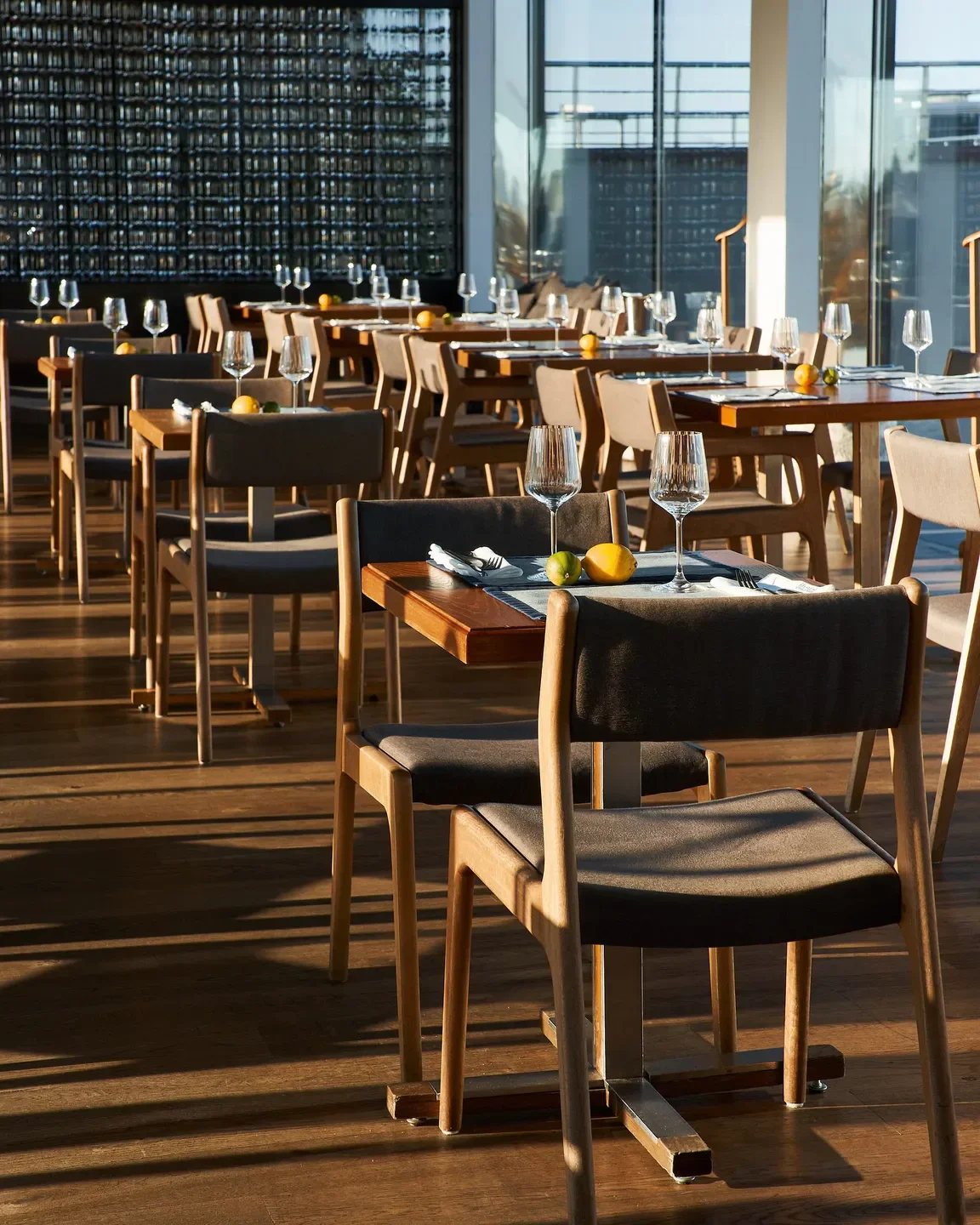 Interior dining at Mansarda restaurant in St Petersburg, with elegant table setting.
