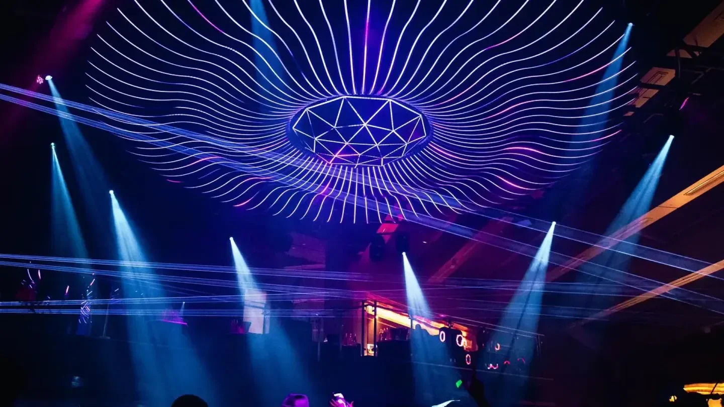 Dramatic lighting inside Mansion Nightclub in Vancouver, with modern ceiling design.