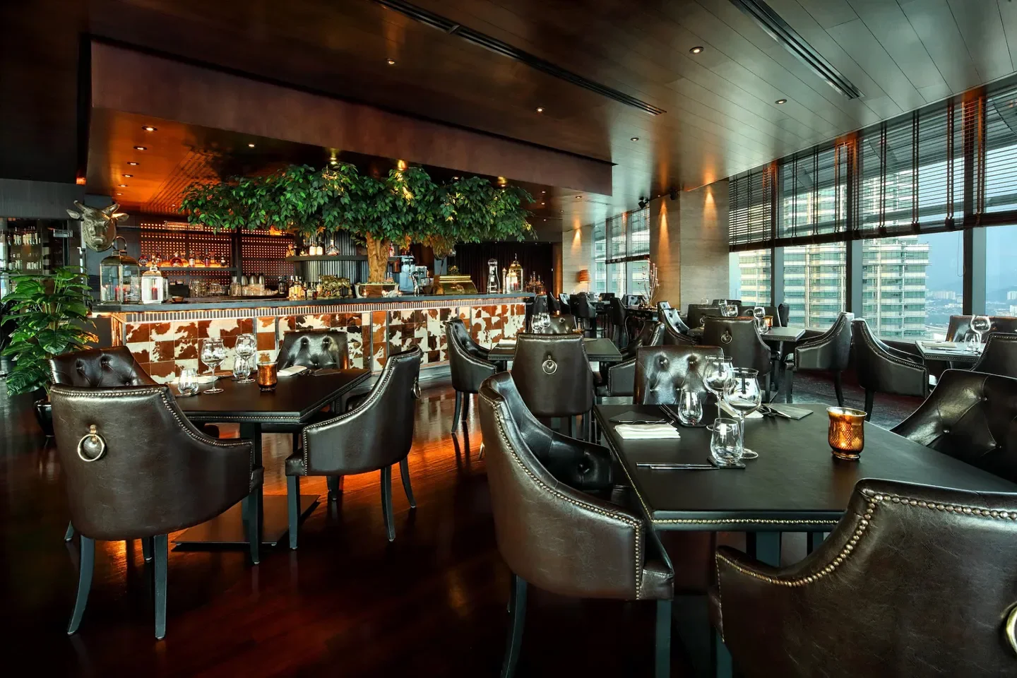 Elegant dining at Marble 8 restaurant in Kuala Lumpur with city views and stylish decor.