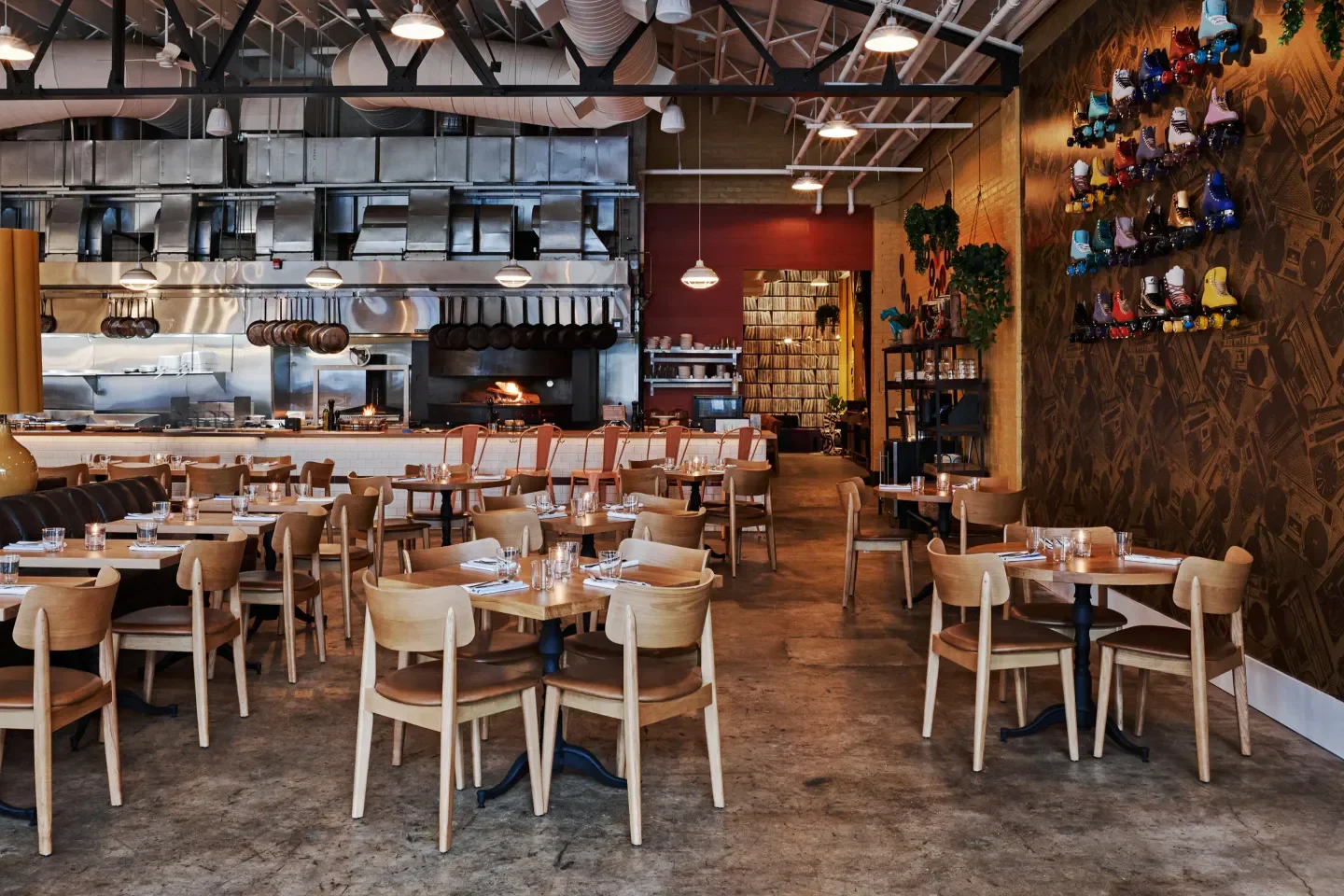 Interior of Marcus Bar & Grille in Atlanta, featuring stylish seating and an open kitchen.