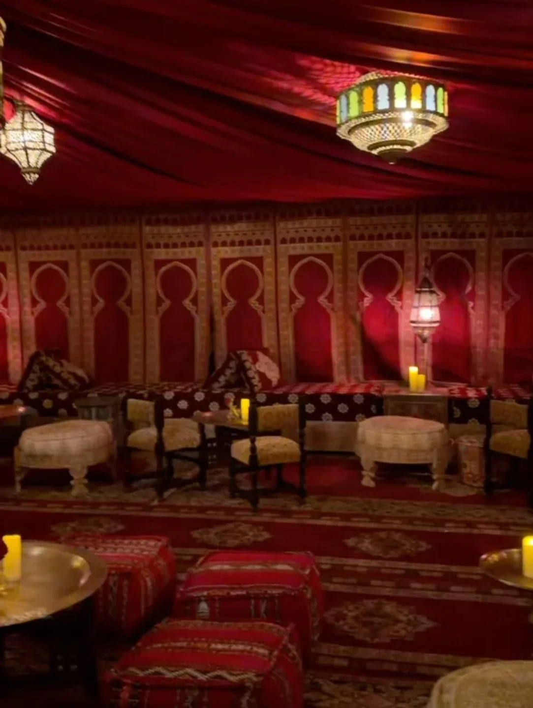 Luxurious tent interior at Mare by Casa Tua Capri featuring Moroccan decor and ambient lighting