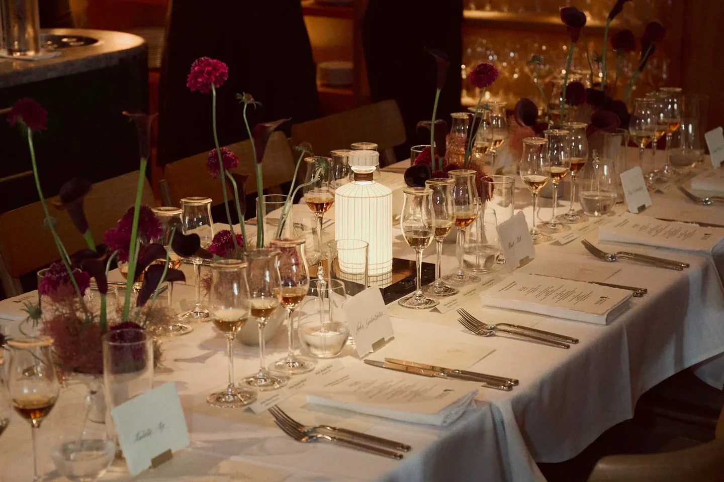 Interior dining at Margaret restaurant in Sydney, Australia, featuring elegant table settings and floral arrangements.