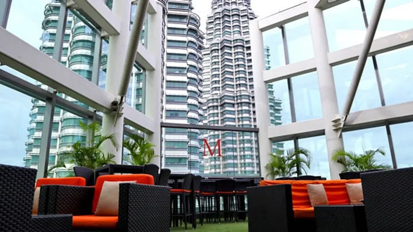 Rooftop dining at Marini’s on 57 in Kuala Lumpur with Petronas Towers views