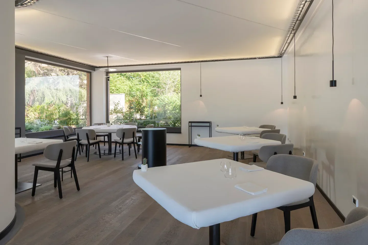 Interior dining space at Marotta Ristorante in Campania, featuring stylish seating and tables.