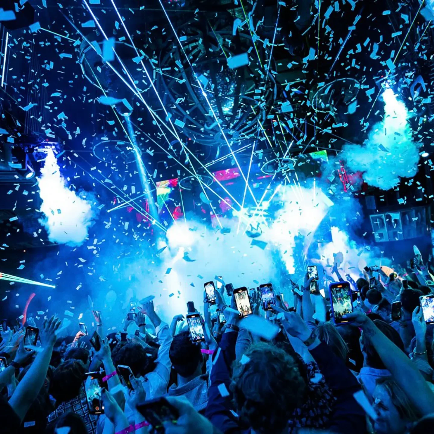 Confetti and energy at Marquee Nightclub in Las Vegas, as people film the show.