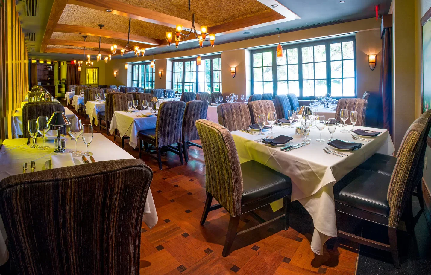 Elegant dining room at Mastro's Steakhouse - Costa Mesa, Orange County, ready for guests.