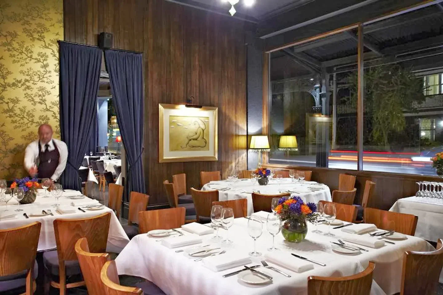 Interior of Matteo's restaurant in Melbourne, featuring elegant tables and ambiance.