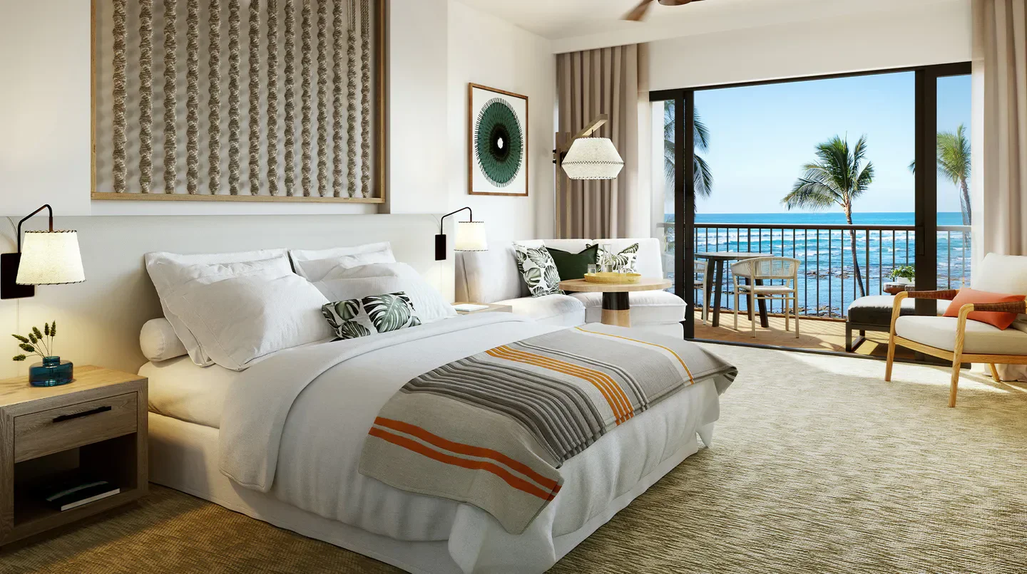 Ocean view bedroom at Mauna Lani, Auberge Resorts Collection on Maui with balcony.