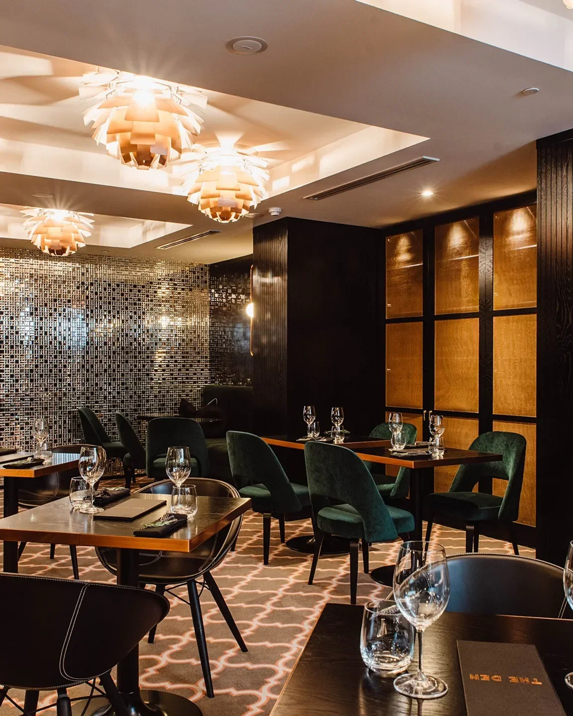Elegant dining area at Mayflower Restaurant in Adelaide, with stylish decor and lighting.