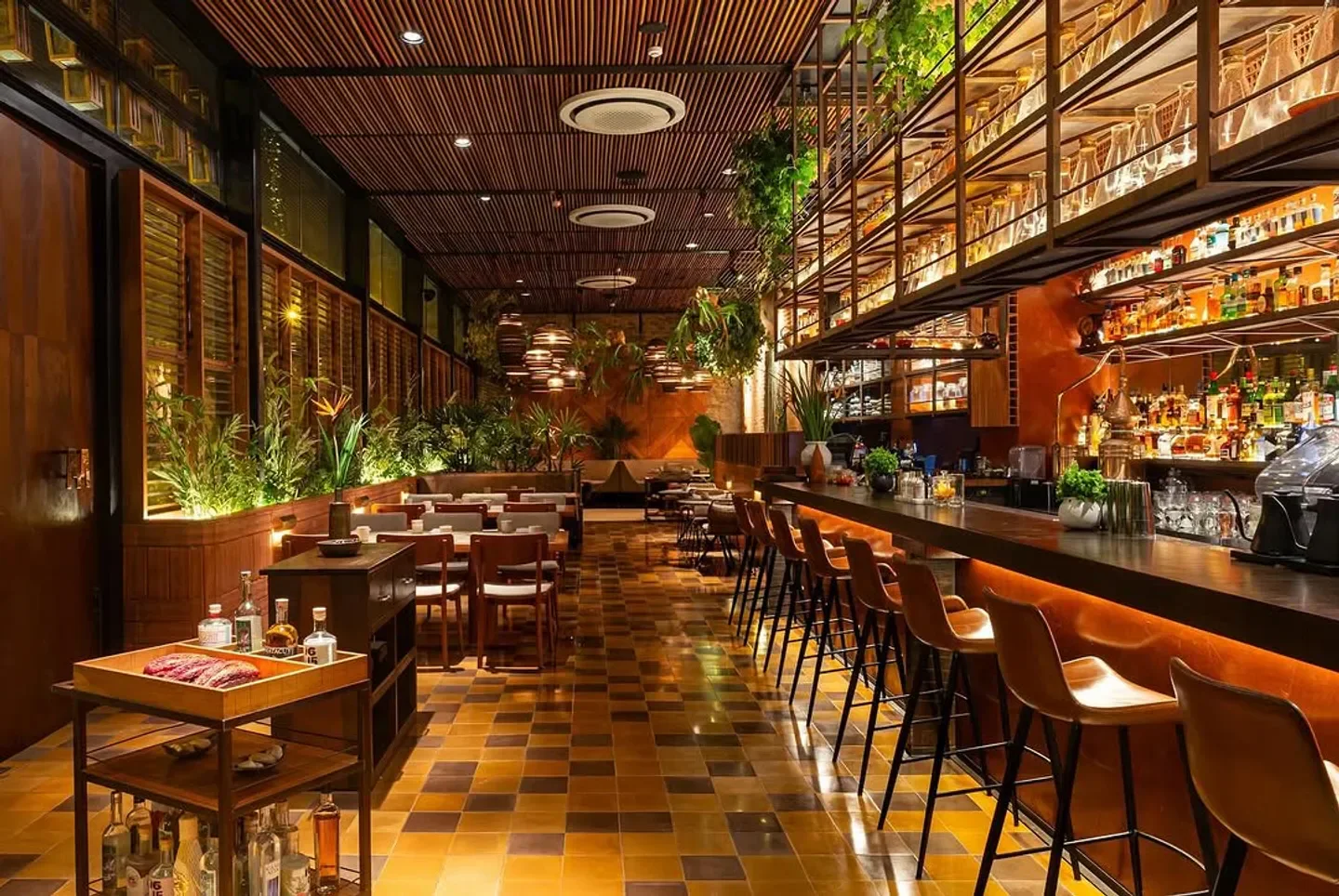 Interior of Mayta restaurant in Lima, Peru, featuring a stylish bar and dining area.