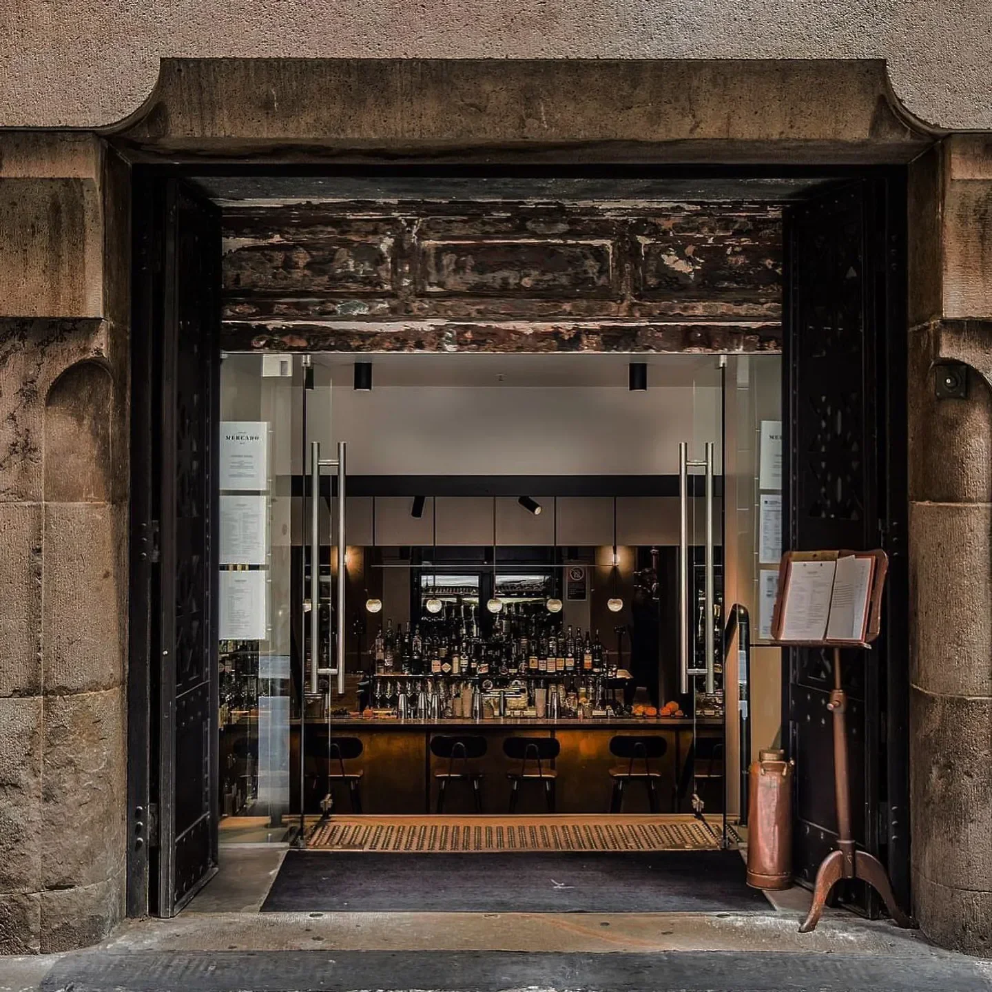 Entrance to Mercado restaurant in Sydney, featuring a stylish bar and interior.