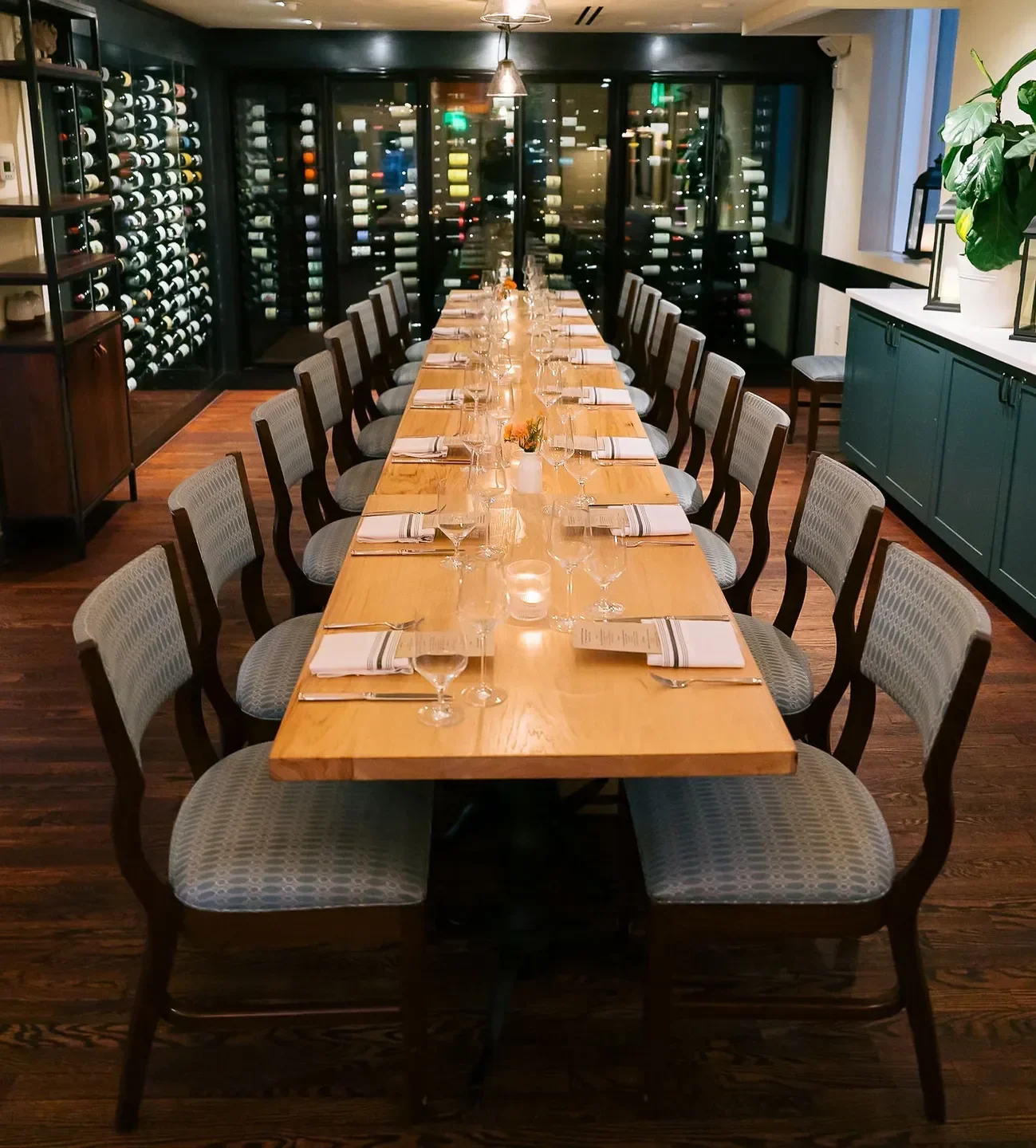 Elegant dining room at Mercantile Dining & Provision in Denver, prepared for service.
