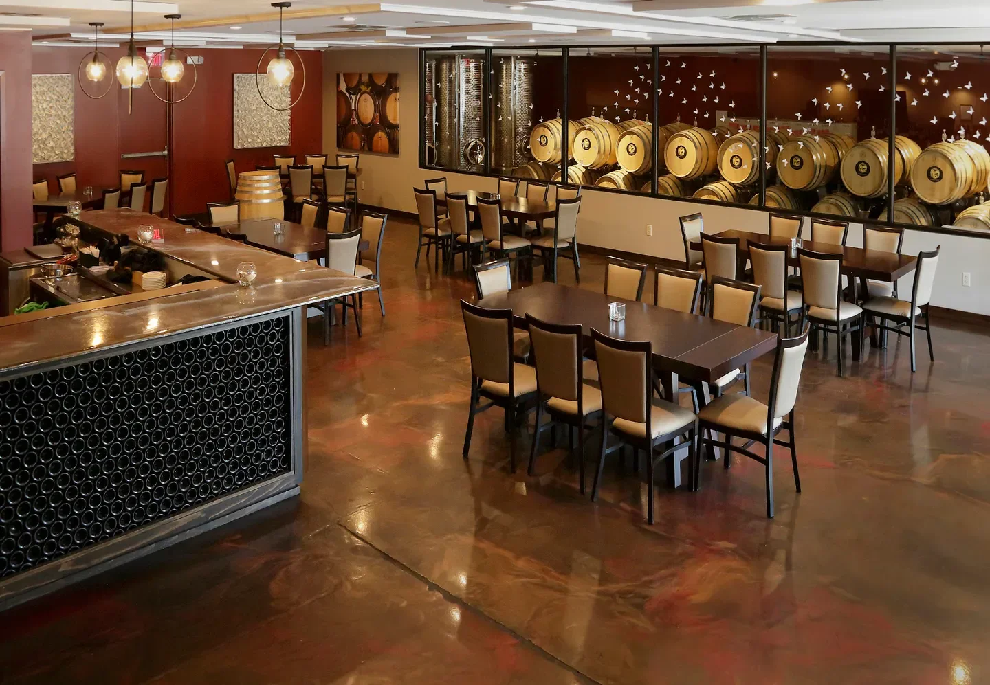 Interior of Mermaid Winery - Virginia Beach restaurant in Virginia Beach featuring wine barrels.