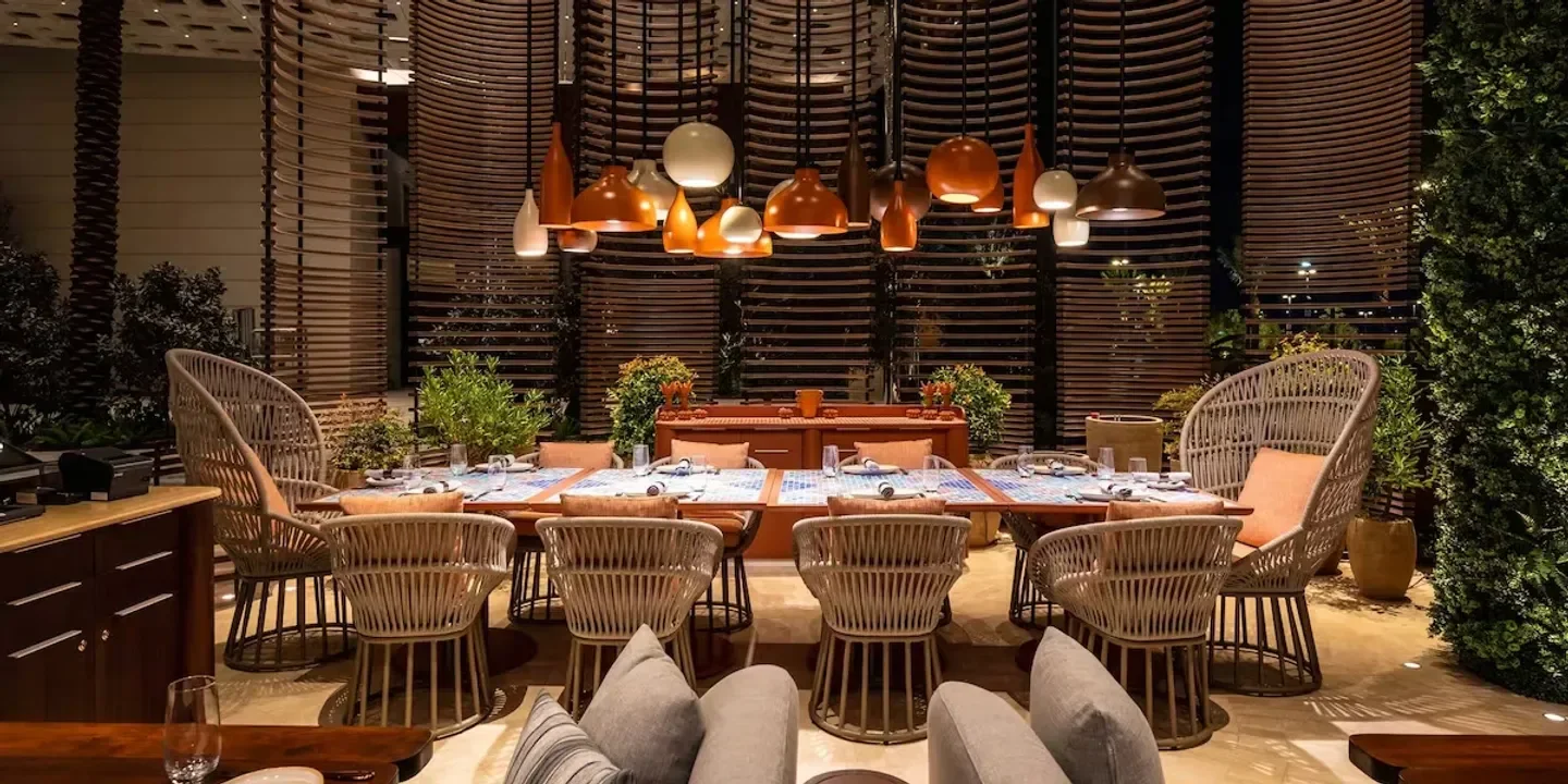Dining space at Mijo Modern Mexican in Las Vegas, featuring stylish lighting and decor