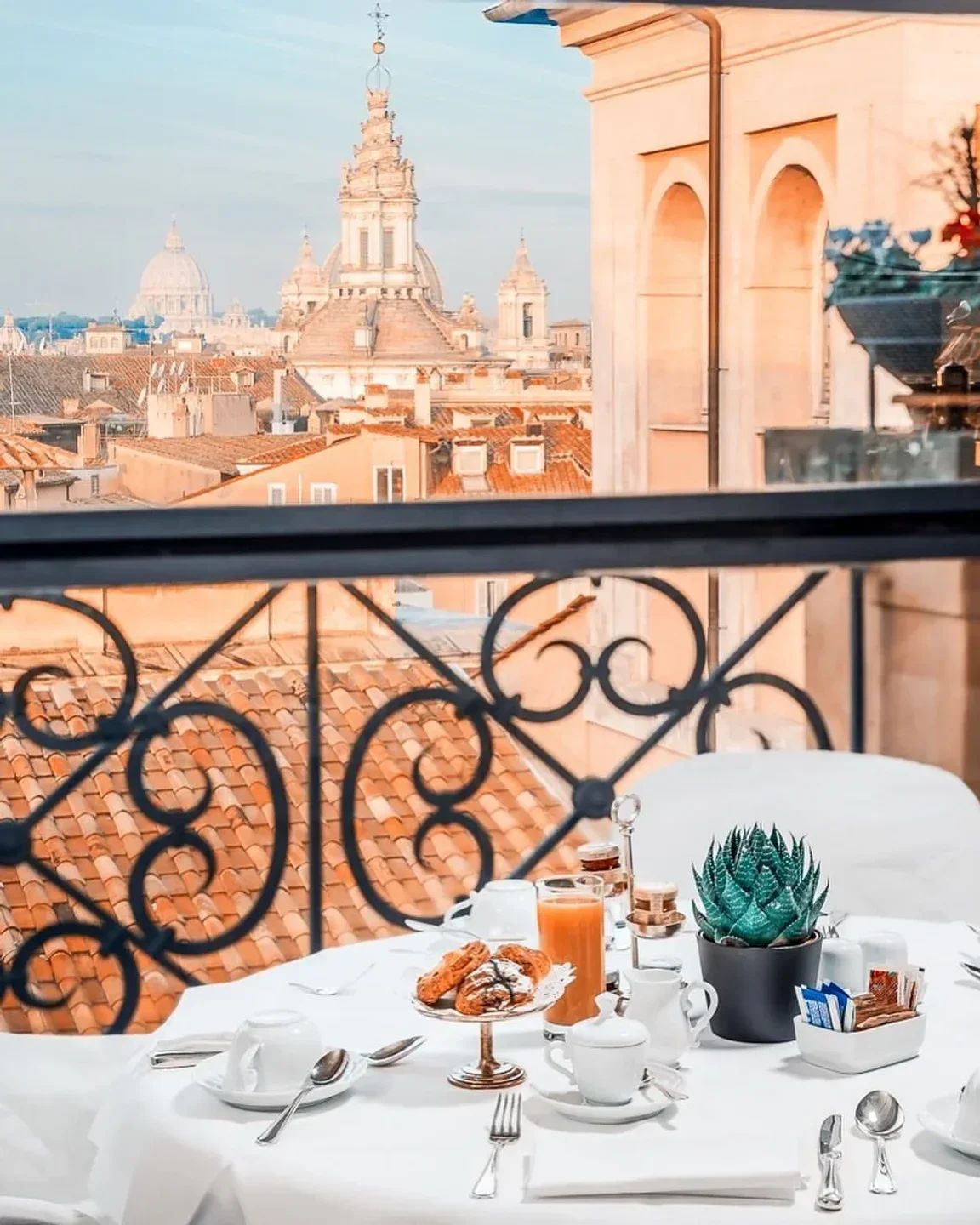Breakfast table with a view at Minerva Rooftop Garden in Rome