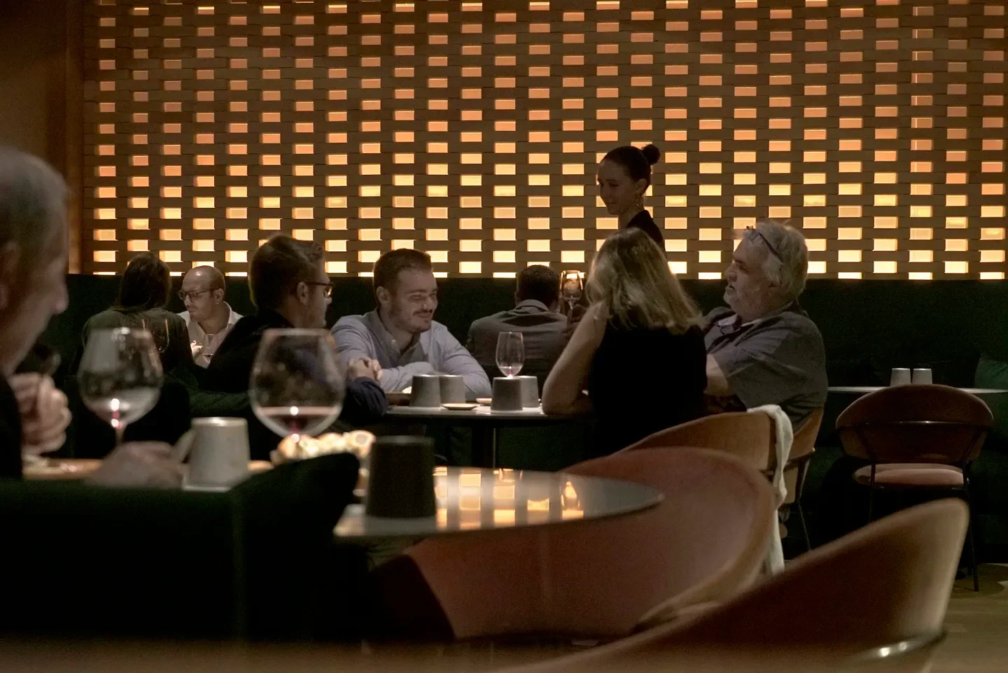 Miraflores restaurant in Lyon: diners enjoying the ambiance and wine