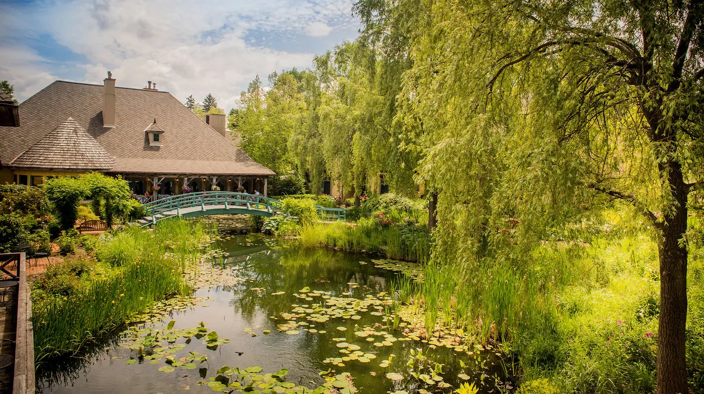 Scenic pond and bridge at Mirbeau Inn & Spa Skaneateles, near Saratoga