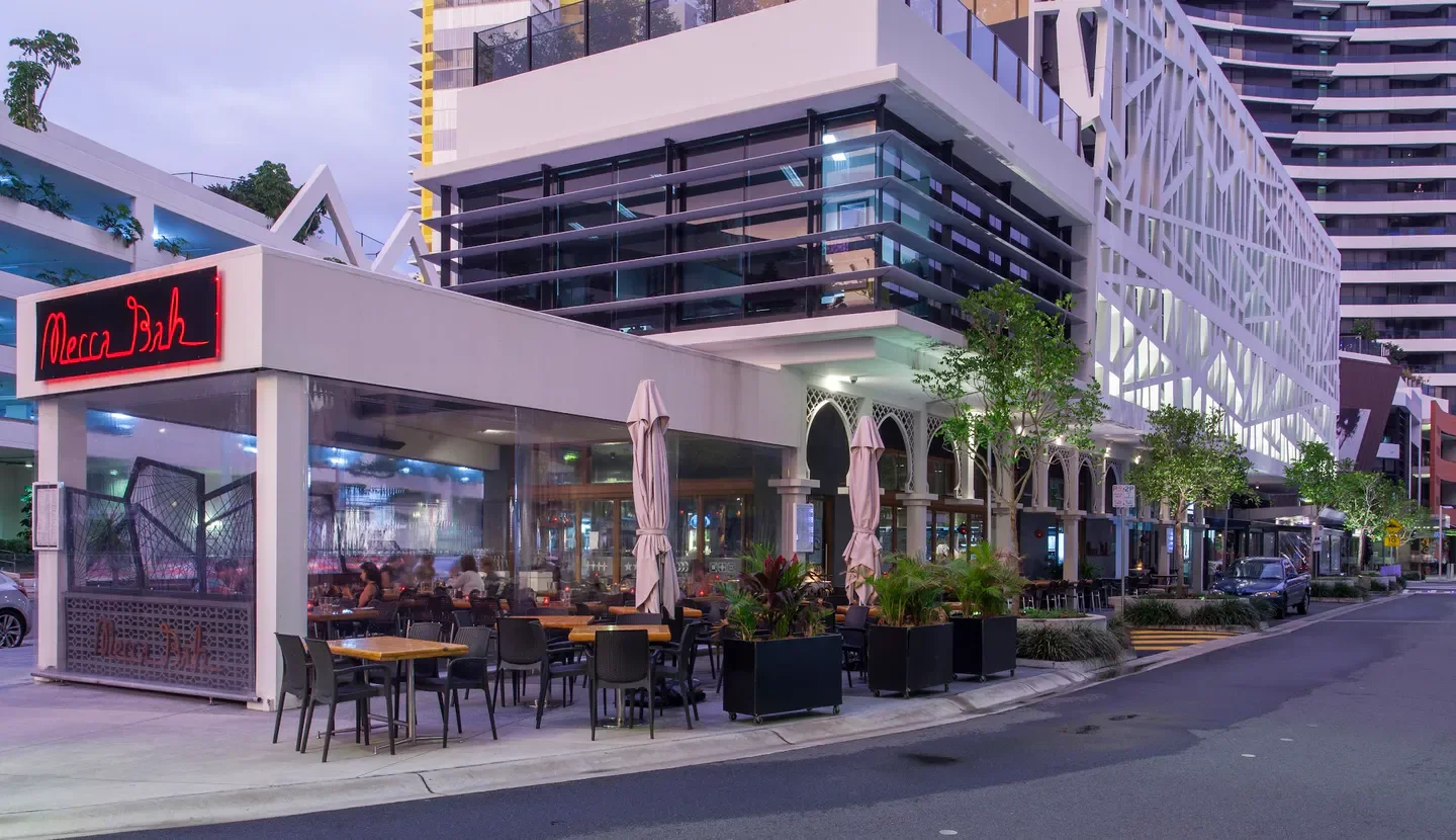 Exterior of Miss Moneypenny's Broadbeach restaurant in Gold Coast with outdoor seating.
