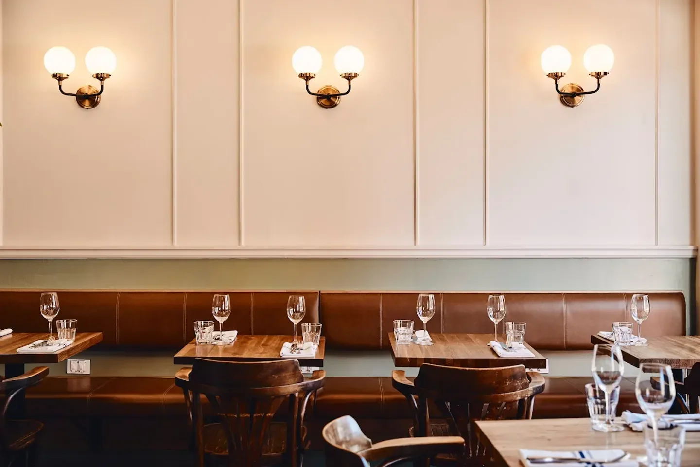Interior view of Moccione restaurant in Montreal, featuring stylish decor and seating