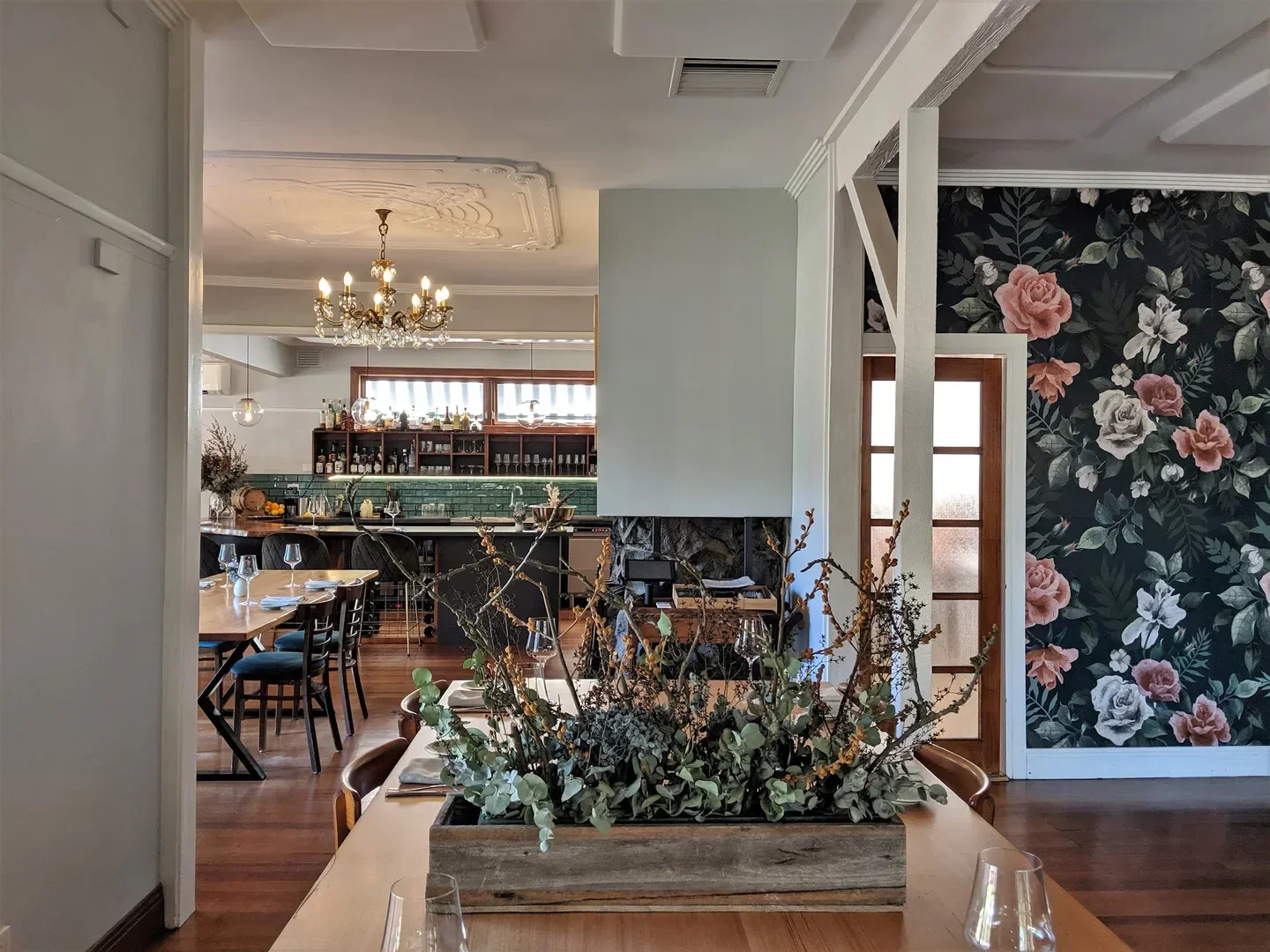 Interior of Moke Dining in Mornington Peninsula, featuring floral wallpaper and elegant decor