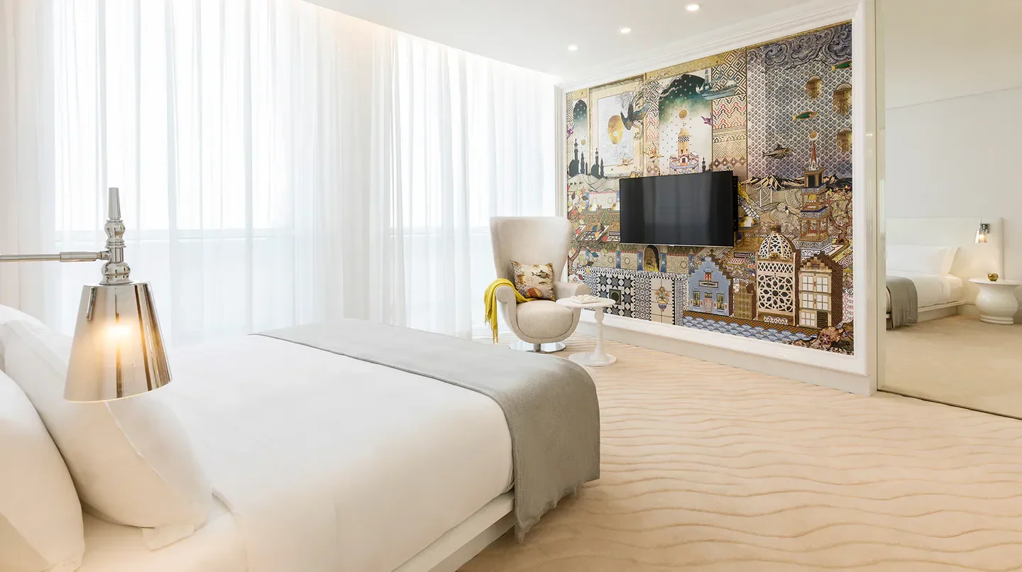 Modern hotel room interior at the Mondrian Doha in Doha, Qatar with unique art.