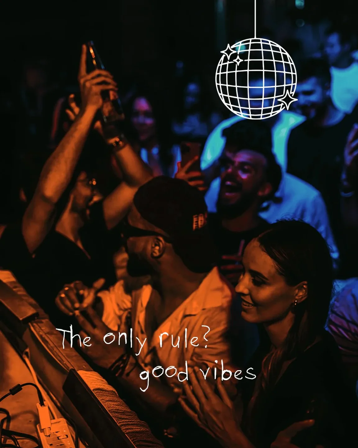 People enjoying the vibrant atmosphere and music at Monkey Tale beach club