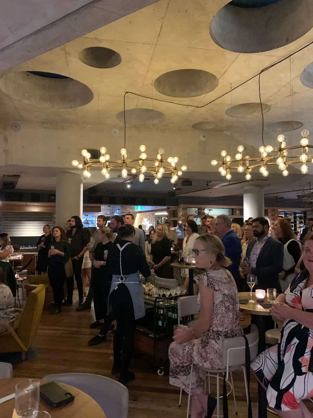 Interior of Monster Kitchen and Bar in Canberra, with guests and stylish decor