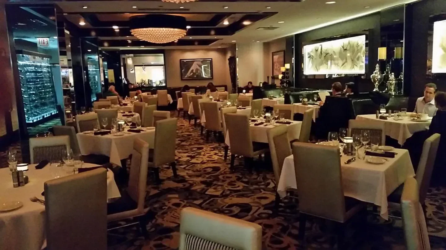 Interior of Morton's The Steakhouse in Chicago, with tables set for dining.