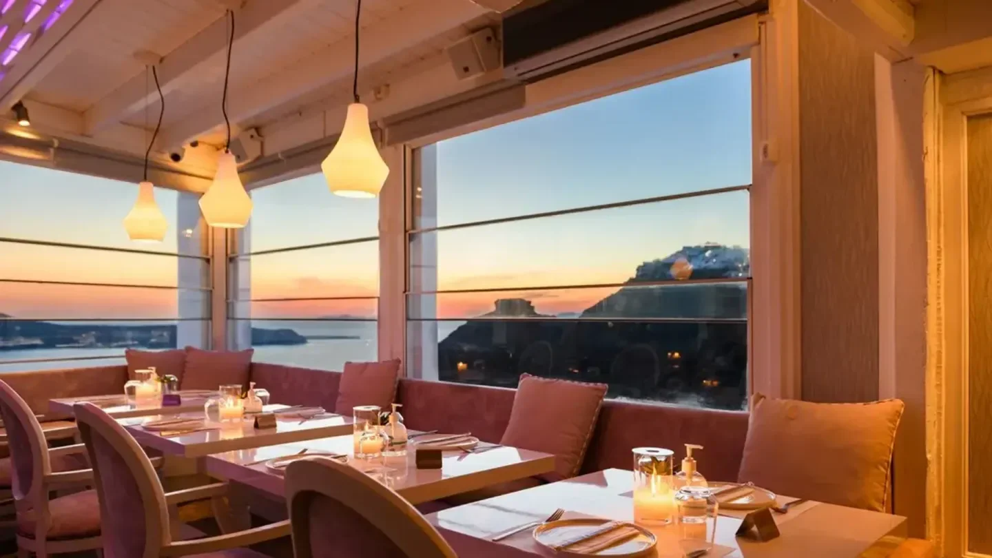 Interior of Mylos Champagne in Santorini with stunning sunset views over the Aegean Sea