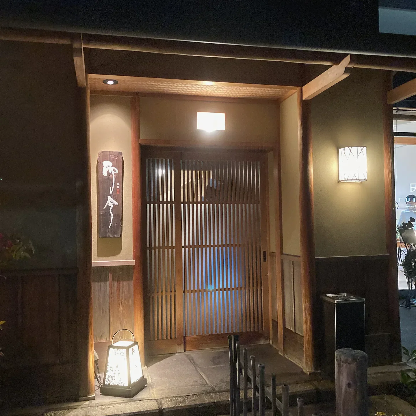 Entrance of NARA NIKON restaurant in Nara, Japan with traditional Japanese architecture.