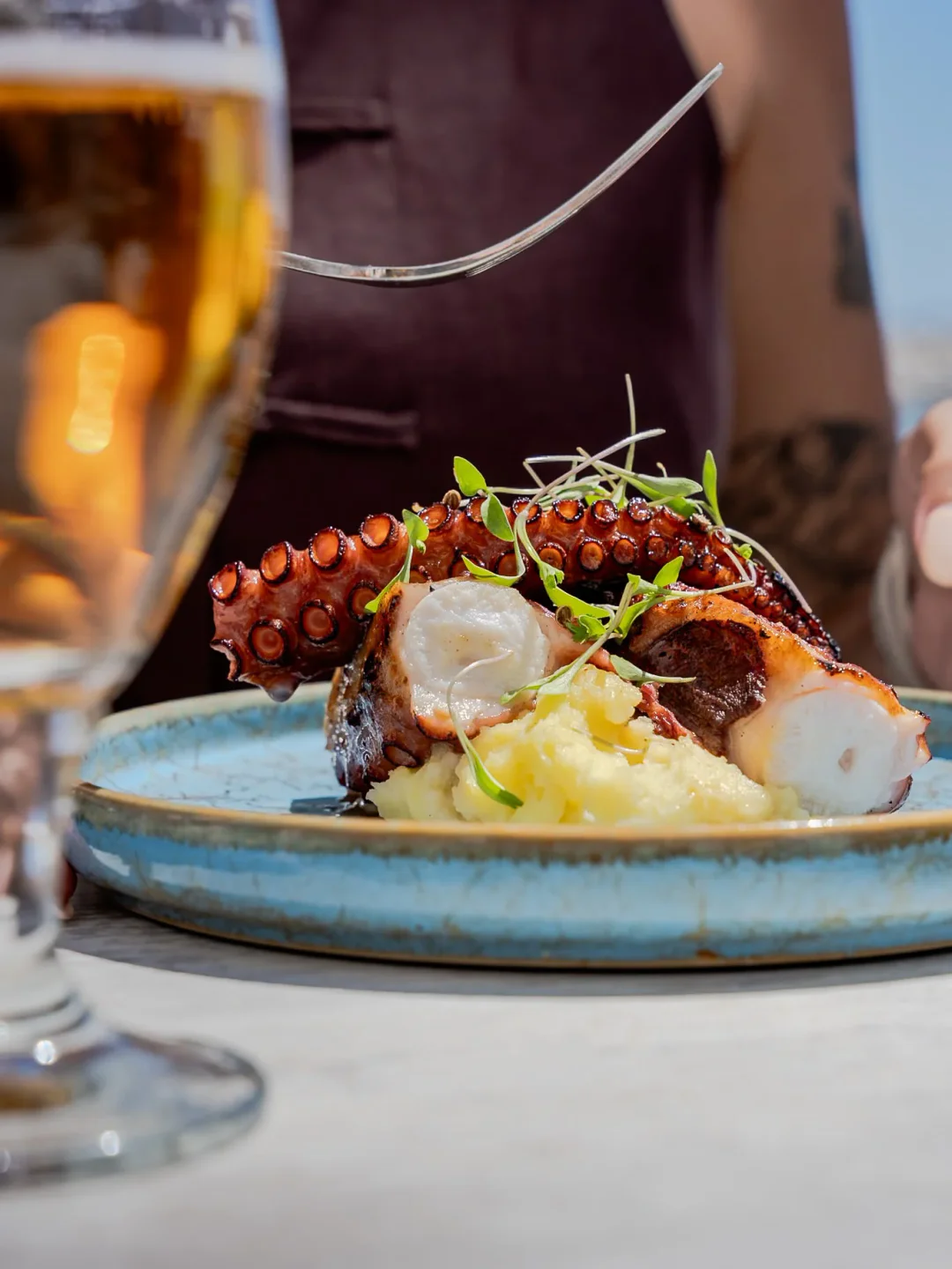 Delicious grilled octopus with mashed potatoes, a signature dish at Navaya restaurant in the city.