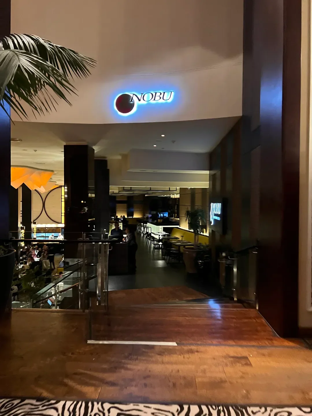 Entrance view of Nobu Cape Town restaurant in Cape Town, featuring the Nobu logo