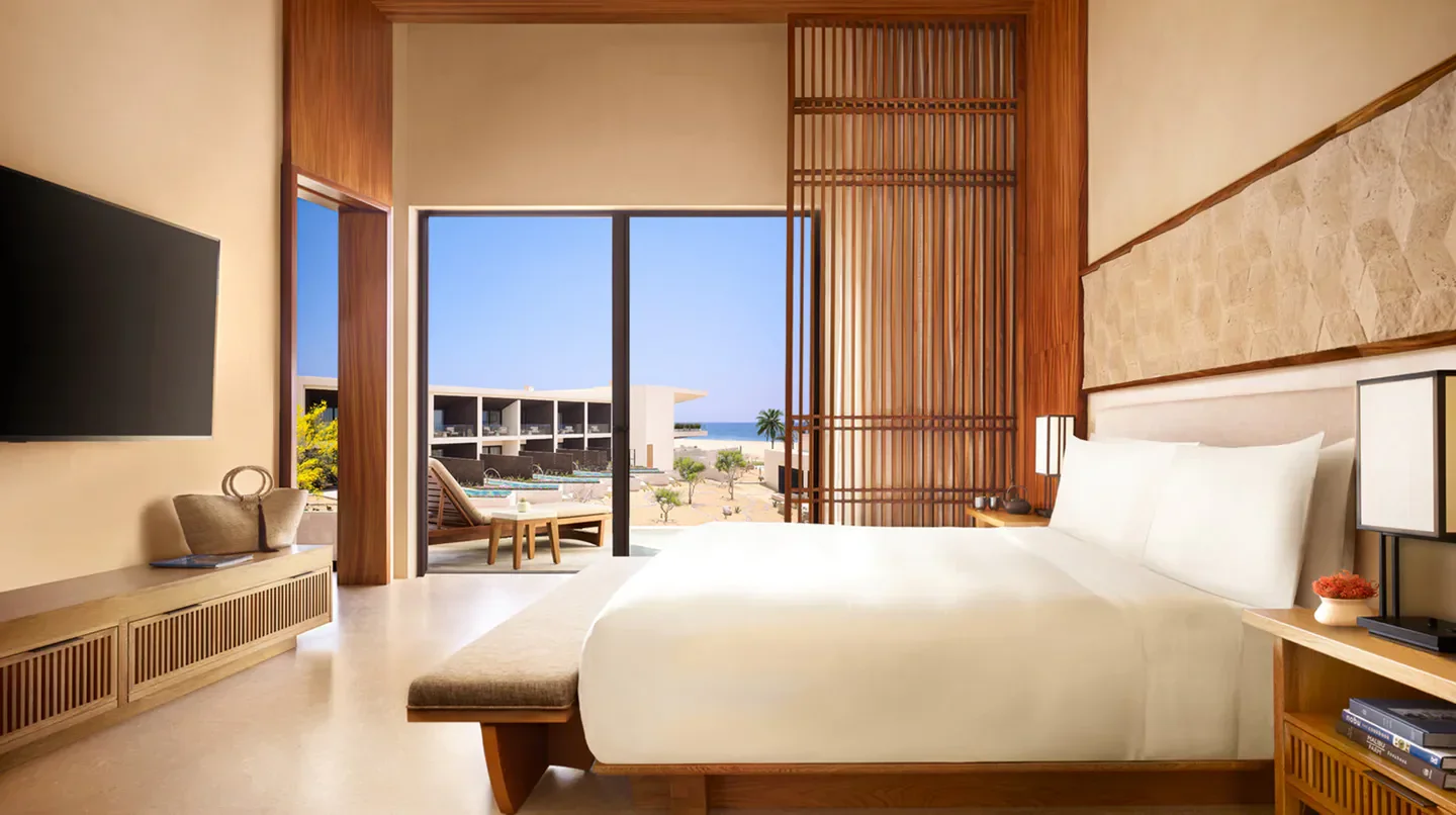 Spacious bedroom at Nobu Hotel Los Cabos, Cabo San Lucas, with stunning ocean views.