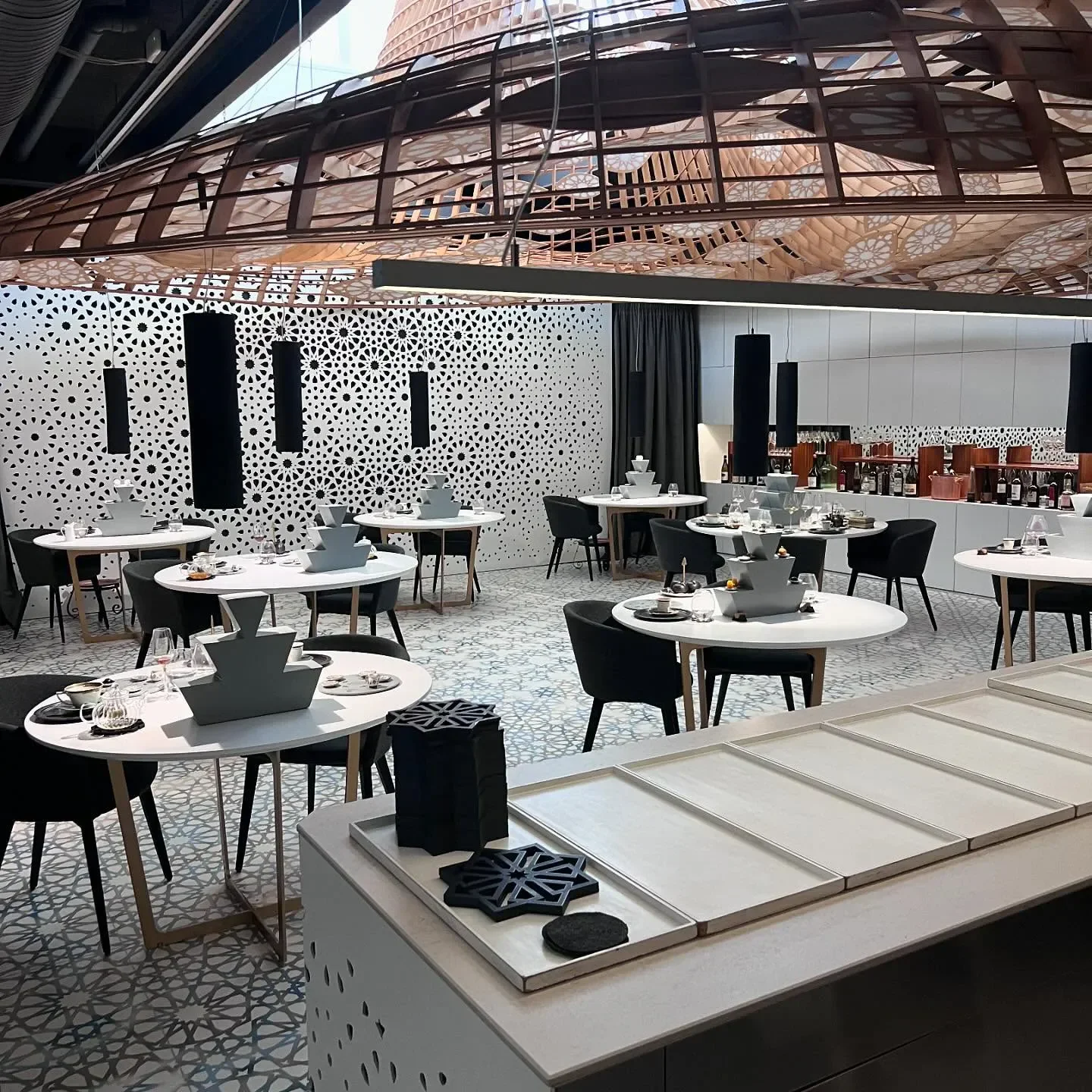 Elegant dining room interior at Noor restaurant in Andalusia, featuring unique decor.