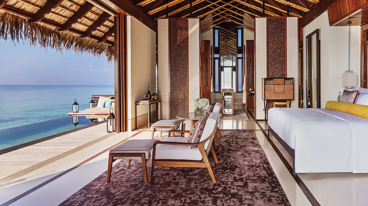 Luxury suite at One&Only Reethi Rah in the Maldives, with ocean view and private pool.