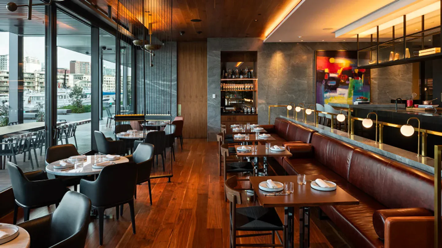 Interior dining at Onemata restaurant in Auckland, with views and stylish decor.