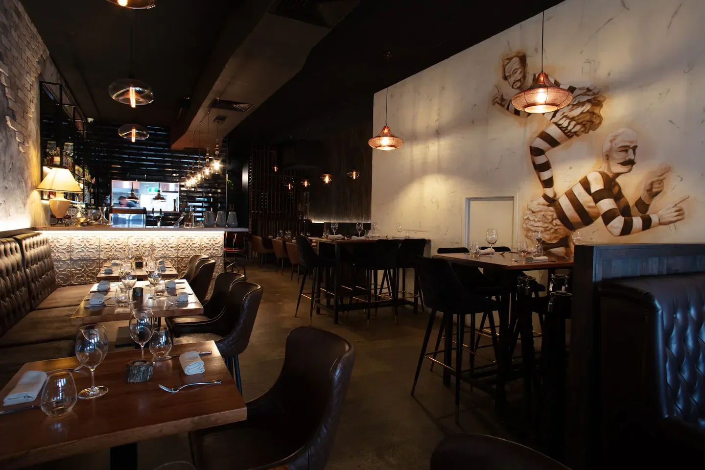Interior of Orléans Restaurant and Bar on the Sunshine Coast, featuring stylish decor and artwork.