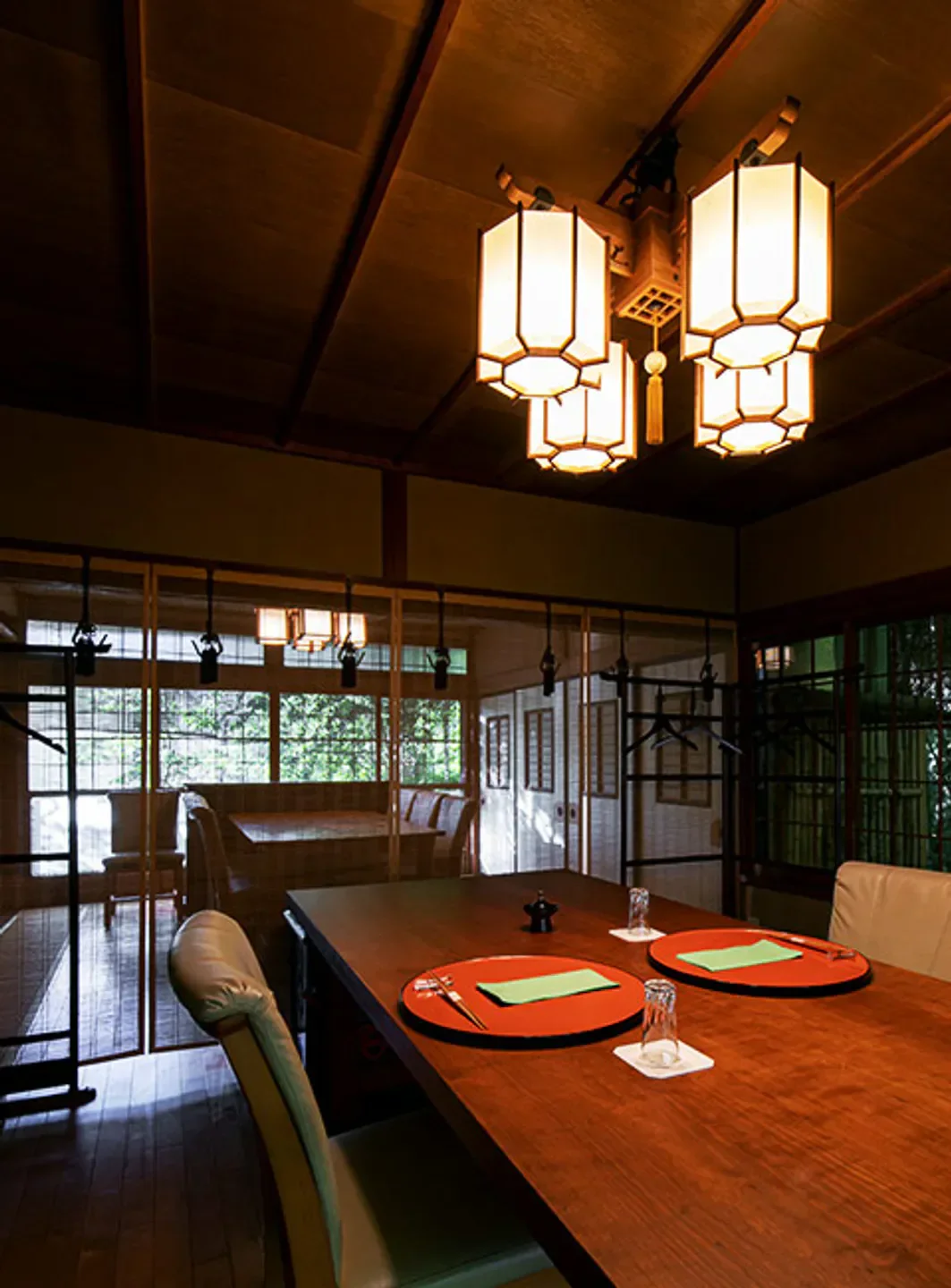 Interior of Oryori Hanagaki restaurant in Nara featuring traditional Japanese decor and lighting.