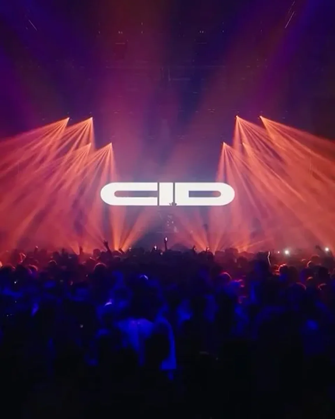 Crowd enjoying a vibrant DJ set with laser lights at Pacha New York in the city