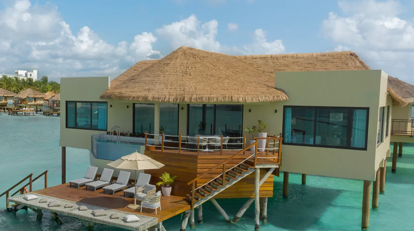 Luxury overwater bungalow at Palafitos Overwater Bungalows in Playa del Carmen, Mexico