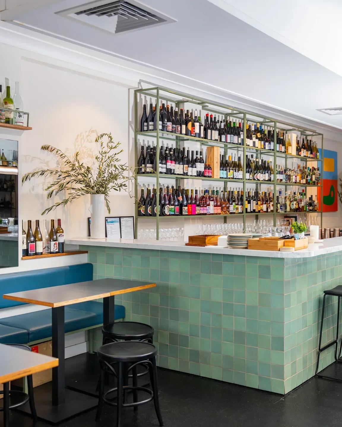 Interior of Paloma Wine Bar in Gold Coast, featuring bar, seating, and wine selection.