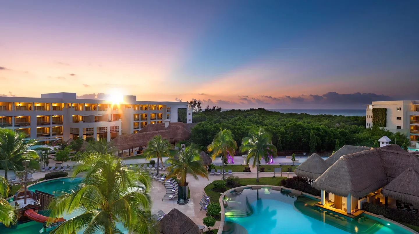 Sunset view of the pools and hotel at Paradisus Playa del Carmen, Playa del Carmen resort