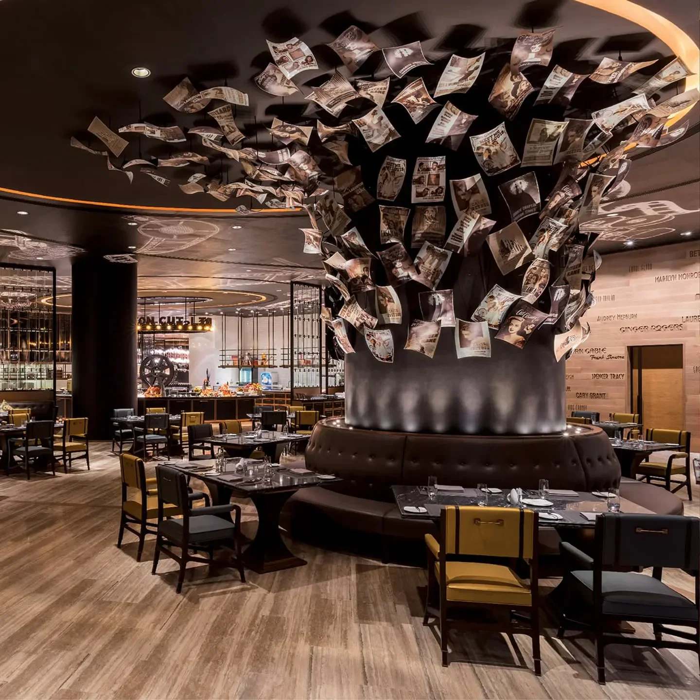 Elegant dining at Pearl Dragon in Macau, featuring unique art installation on the ceiling