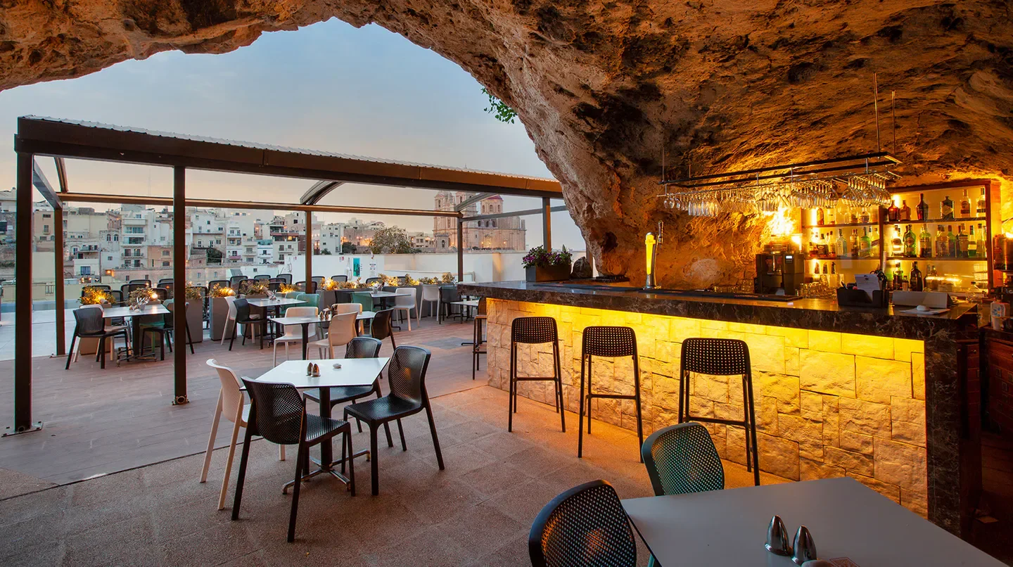 Rooftop bar at Pergola Hotel & Spa in Malta with a unique cave-like design.
