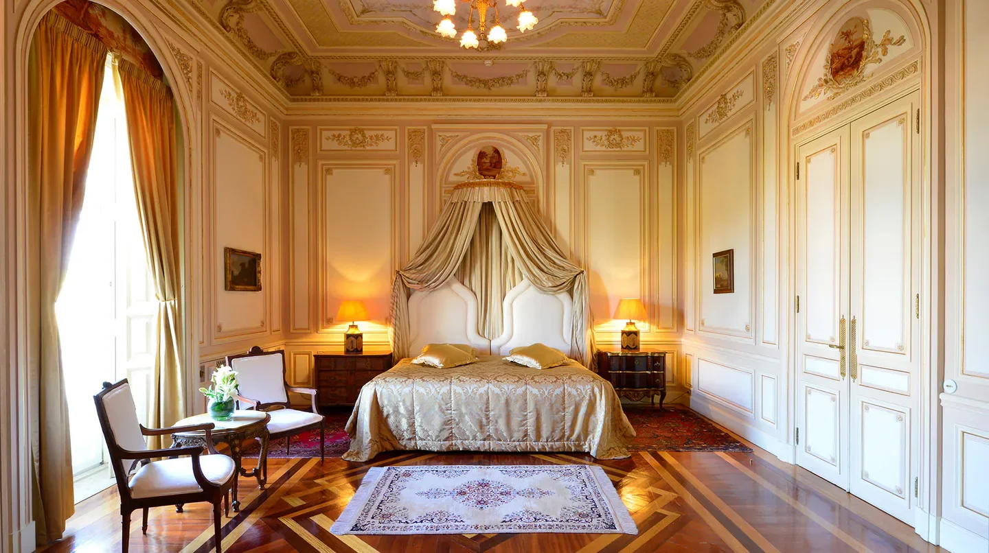 Elegant bedroom at the Pestana Palace Lisboa Hotel & National Monument in Lisbon.