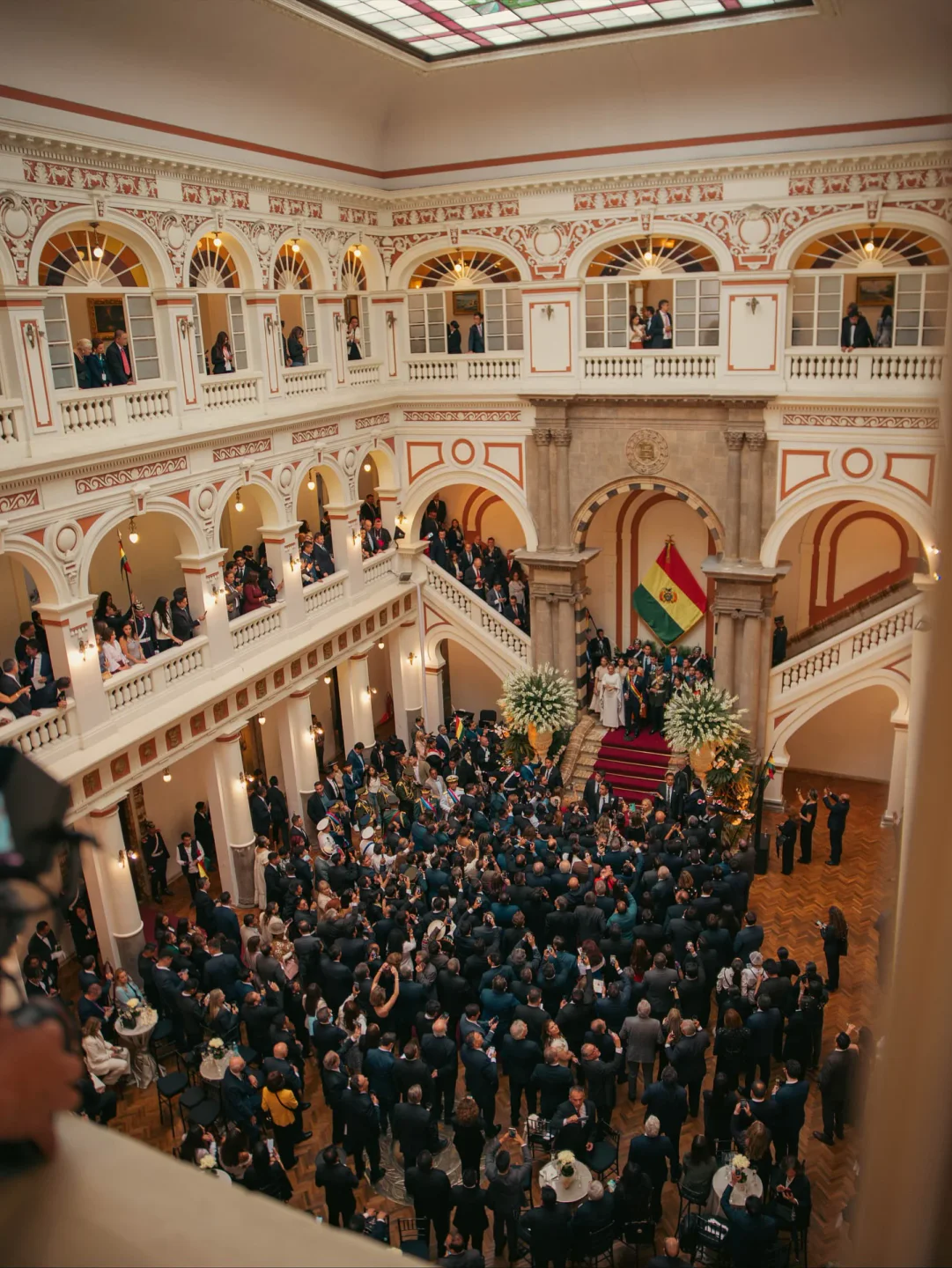 Interior view of Phayawi restaurant in La Paz, Bolivia, featuring an event with many people in attendance.