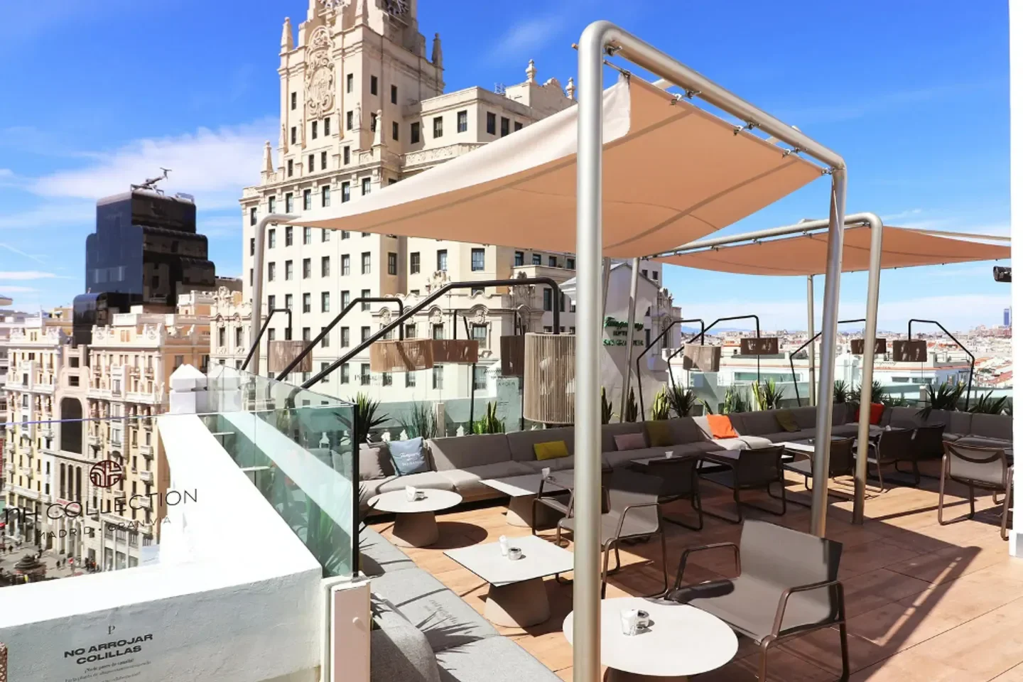 Rooftop terrace at Picalagartos Sky Bar in Madrid with stunning city views.